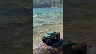 Axial SCX24 Forest green Dodge Power Wagon 4x4 124 scale rock crawler getting wet [upl. by Rabbaj744]