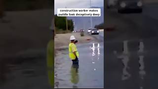 Construction worker makes puddle look deceptively deep [upl. by Anole]