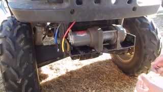 HOW TO INSTALL A WARN WINCH ON AN ATV [upl. by Sonafets]