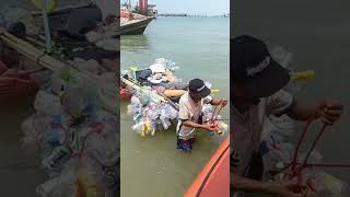 Homeless man rescued after trying to sail to Koh Larn on homemade bottle raft reels pattaya [upl. by Lemmy984]