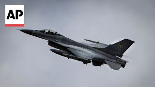 Zelenskyy displays Ukraines new F16 fighter jets to combat Russia [upl. by Enortna]