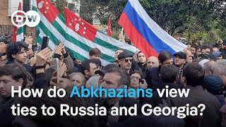 Protesters in Abkhazia storm parliament over investment agreement with Moscow  DW News [upl. by Atiuqel]