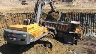 Volvo EC700B Excavator Loading Caterpillar Dumpers [upl. by Naujaj]