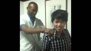 Errol Lynch of Tuina World treating neck pain in China [upl. by Rehotsirhc541]