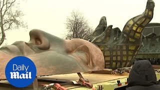 Statue of Libertys original torch moved to new museum home [upl. by Robbert493]