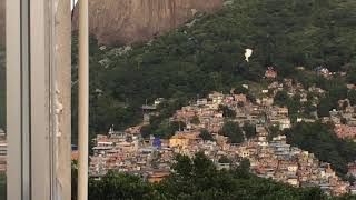 Helicóptero militar atirando em Rocinha [upl. by Eytak]