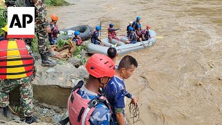 Two buses carrying at least 60 people swept into river by landslide in Nepal [upl. by Loris]