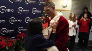 Soldier Dressed As Santa Surprises Mom Nurse At Hospital With Early Homecoming [upl. by Ailyn605]