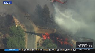 Helicopters extinguishing fire with water drops [upl. by Roshan]