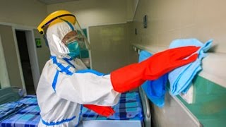 Ebola Gear What’s It Like to Put on a Hazmat Suit [upl. by Witkin]