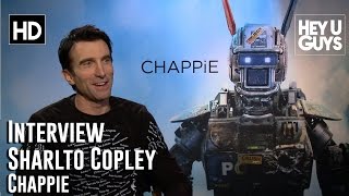 Sharlto Copley Interview  Chappie [upl. by Huber]