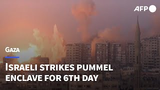 Israeli strikes pummel Gaza for sixth day  AFP [upl. by Selmore]