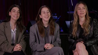 HAIM Sisters Talk Licorice Pizza Touring amp quotHanukkah Songquot Remix [upl. by Lissie]