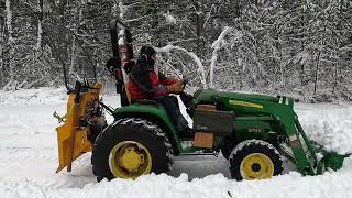 John Deere 3025e Plowing 12 Inches of Snow [upl. by Maryjane67]