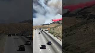 Plane dropping aerial fire retardant on a wild fire Gorman California [upl. by Aylmer]