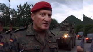 Nato troops retreat from Kosovo Serbs [upl. by Ner544]