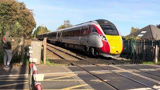 800202 passing doddington road level crossing [upl. by Annawik]