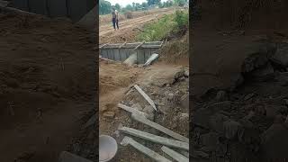 Construction site headwall of pipe culvert on canal [upl. by Emilie31]