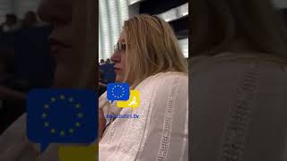 Romanian MEP Șoșoacă kicked out of the European Parliament session with screams icons and a muzzle [upl. by Schlosser]