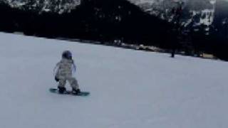 Kid snowboards from Holiday lift at Snoqualmie Summit Central [upl. by Fleda]