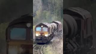 DB cargo the track cleaner train the class 66 in EWS and DB [upl. by Adliw]