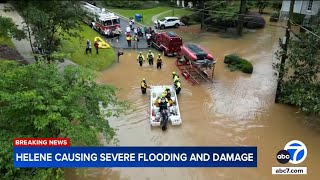 Catastrophic flooding from Hurricane Helene forces people to seek safety on rooftops [upl. by Sisxela]