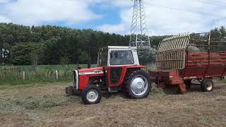 Massey Ferguson 550 met ladewagen krone hs 18 [upl. by Negah902]