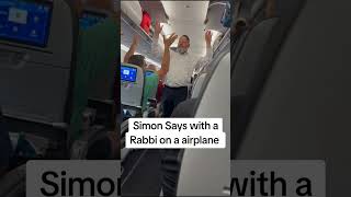 Rabbi Nosson Neuberger entertaining a delayed plane with a game of Simon Says [upl. by Nike]