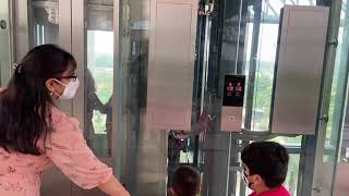 Mitsubishi Lift  Glass lift  Worldmark Sector 65  Short Elevator ride [upl. by Remat]