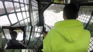 Bobcat Skid Steers Pushing Snow Piles [upl. by Yraek63]