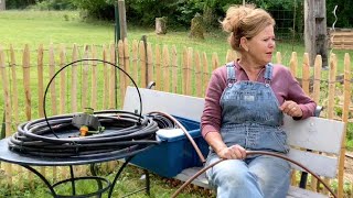 Inis Moestuin 58 Aanleg water druppelsysteem amp bloemen planten leeuwenbekken en zonnebloemen [upl. by Icnarf985]