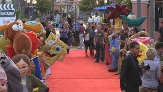 Universal Orlando characters greet attendees on the red carpet at private party [upl. by Peper]