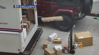 EXCLUSIVE USPS Worker Caught On Camera Tossing Packages Out Of Mail Truck [upl. by Notsob15]