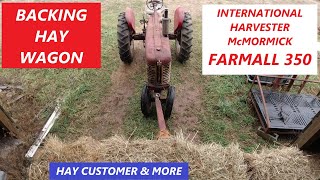 Backing Hay Wagon wFarmall 350 Hay Customer amp More [upl. by Tierell]