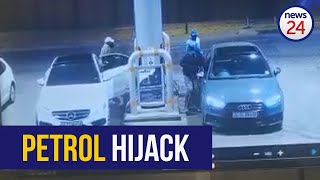 WATCH  Hijackers steal Audi as Joburg driver stops to fill up his car at a garage [upl. by Atinaujnas544]