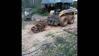 John Deere tracks over wheels installation 328 325 How to install loegering skid steer tracks [upl. by Elamrej]