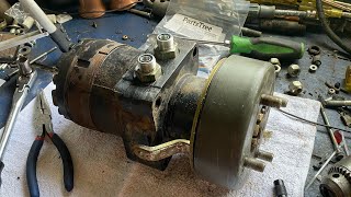 Replacing the shaft seal on a hydraulic wheel motor [upl. by Boeke]