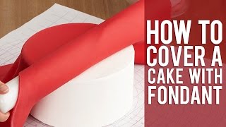 How to Cover a Round Cake with Fondant [upl. by Shapiro937]