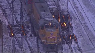 Crews heaters working hard to keep train tracks from freezing Tesla owners run into problems in ex [upl. by Asilav]