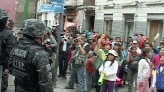 Bolivia children clash with police over child labour [upl. by Atoiganap932]