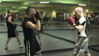 Boxing Basics How to Do the Roll Over Focus Mitt Drill [upl. by Maura]