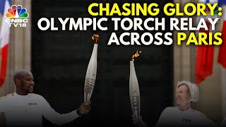 Olympic Torch Travels Across Iconic Spots In Paris  Olympic 2024  N18G  CNBC TV18 [upl. by Esilenna]