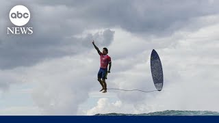 Viral photo of Olympic surfer’s midair celebration [upl. by Nodnek]