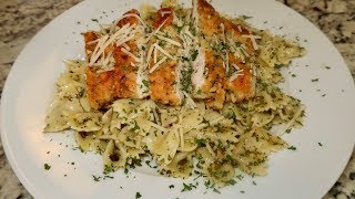 PARMESAN CRUSTED CHICKEN OVER CREAMY PESTO FARFALLE [upl. by Darahs]