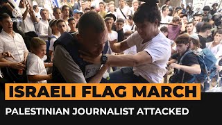 Palestinian journalist attacked by rightwing ‘Jerusalem Day’ marchers  Al Jazeera Newsfeed [upl. by Spillihp]