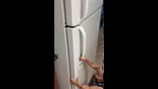 How to DIY Child proof top freezer refrigerator [upl. by Ahsenor642]