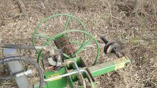 Rolling barbed wire with wire winder on New Holland LS170 [upl. by Voss]