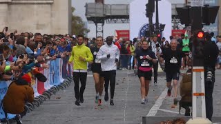 Parisinos compiten con Kipchoge para estar en el maratón popular de JJOO 2024 [upl. by Kristos]