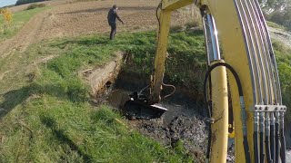 Clearing The Culvert And And Desilting The Drainage Ditch With An Excavator [upl. by Lothar]