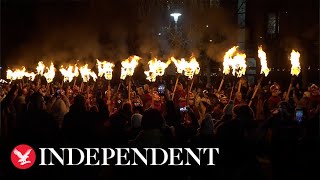 Thousands of torches light Edinburgh streets kicking off Hogmanay celebrations [upl. by Ximenes413]